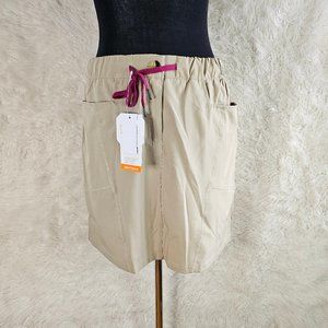 Little Donkey Andy Women's Beige Elastic Waist Pockets Lined Tennis Skirt Size M